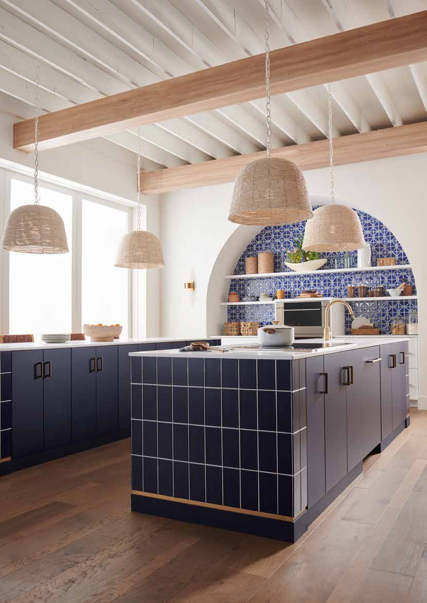 European kitchen inspiration with navy slab cabinets and a white countertop